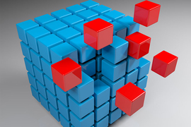 3D illustration of what looks like a 5 by 5 Rubik's cube. Most cubes are blue, while 5 cubes, separated slightly from the larger structure, are red.