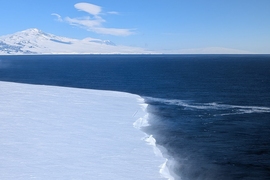 The edge of an ice sheet next to the ocean
