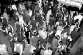 At Saturday's Millennium Ball in the Student Center, students dance to techno rhythms beneath the lights in La Sala de Puerto Rico.