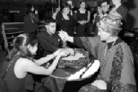 Sanjay K. Rao and Sonia Garg get some advice using the power of the "seeds of time" at the Millenium Ball.