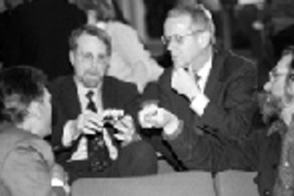 Professor of Anthropology Arthur Steinberg explained the invention of a timepiece to aid calculating latitude, then handed out old clocks and had participants explain why the clocks didn't tell very good time. Those participants included (left to right) Proessors Donald R. Sadoway of materials science and engineering and Richard P. Binzel of earth, atmospheric and planetary sciences; President Cha...