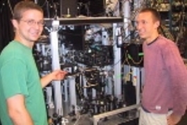 Tom Pasquini (left) and Aaron Leanhardt (right) in front of the machine where they and collaborators cooled a sodium gas to 500 picokelvin.