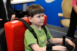 A young stroke patient tests out an MIT-developed robotic therapy device at Blythedale Children's Hospital in Westchester County, N.Y.