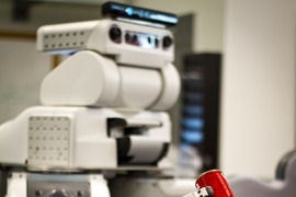 The researchers test their program on a real-life robot, which is able to decide that a can needs to be picked up, then plan and execute the actual motions necessary to lift it from a table.