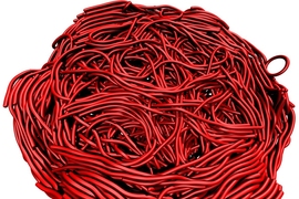 A close-up view of an amyloid plaque model, showing the entangled structure of amyloid fibrils that form a sticky plaque. 