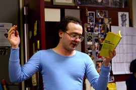 With ironic vigor, MIT graduate student and Society 'onseck' (secretary) D.W. Rowlands acts out a scene from Pel Torro’s <i>Galaxy 666</i>, a remarkably melodramatic piece of science fiction, at a Society meeting.