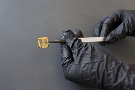 Weinstein and Popa's experimental chip, which they manufactured at MIT's Microsystems Technology Laboratory, is divided into nine identical regions, each of which contains 65 resonators and additional circuitry required to test them.