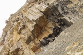 A photo of the permian triassic boundary at Meishan, China. This photo shows the limestone beds in between the volcanic ash beds that the researchers were able to date.