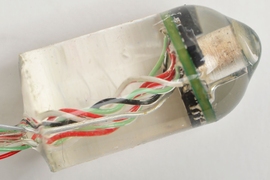 This ingestible electronic device invented at MIT can measure heart rate and respiratory rate from inside the gastrointestinal tract.
