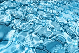 This computational illustration shows a graphene network structure below a layer of water. 
