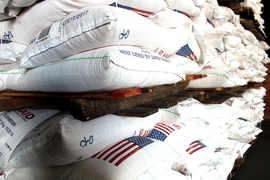 Researchers are systematically exploring a variety of alternative packaging materials and containers to see which work best, and most cost-effectively, at reducing losses in food aid. Pictured are food aid bags in a Texas warehouse.
