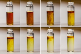 This series of photographs shows the chemical reaction that occurs during the charging of a lithium oxygen battery using lithium iodide as an additive.
