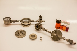 Lithium oxygen battery cell components were used for experiments in the lab.
