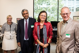 Sophie Vanderbroek of IBM, Anantha Chandrakasan of MIT, Deborah DeSanzo of IBM, and President L. Rafael Reif of MIT visit the site of the new collaborative AI Lab.

