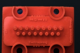 With their staggered spacing, the emitters can produce tightly packed but "aligned" nanofibers, meaning that they can be collected on a rotating drum without overlapping each other.
