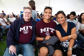 Members of the incoming class of 2023 and their families listen to remarks by President Reif and three professors who are also MIT alums.