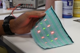 “From the outside it looks like a normal T-shirt, but from the inside, you can see the electronic parts which are touching your skin,” Dagdeviren says. “It compresses on your body, and the active parts of the sensors are exposed to the skin.”