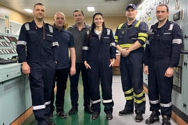 Group photo with six people, with Patricia Stathatou in center.