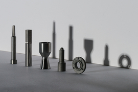Five metal attachments for tools