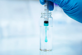 Blue polymer liquid suspended in water
