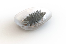 Close up of the adhesive device, which has pattern of angled rows