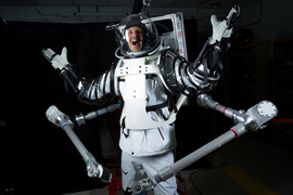 Erik Ballesteros wears the SuperLimbs suit, mid-shout.