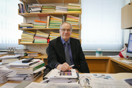 John Joannopoulos sits in his office.