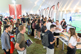A large reception featuring presentations