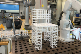 A chair made of modular lattice cubes.