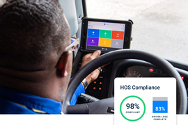 A driver checking a digital compliance interface