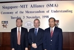 Professor Lim Pin, vice chancellor of the National University of Singapore (left), MIT Provost Robert A. Brown (center) and Nanyang Technological University's president, Dr. Cham Tao Soon, at yesterday's ceremony formalizing the collaboration between the three schools.
