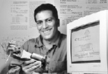 Daniel DiLorenzo with one of his first inventions, a robotic arm measured to his own hand and fingers.
