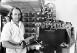 MIT Professor Rodney Brooks with Cog, the human-like robot he and colleagues are building.