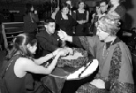 Sanjay K. Rao and Sonia Garg get some advice using the power of the "seeds of time" at the Millenium Ball.