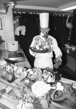 Aramark Executive Chef Peter Dumke, formerly of the Four Seasons, does an airborne stir-fry at his new job at MIT.