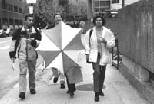Team Delta makes its way toward second place in the Sloan Challenge fundraising competition. Left to right: MBA students Amit Jain, Craig Banaszewski and Anupama Bhave; Gwendolyn Hasse is behind the umbrella.