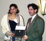 Sophomore Sumita Pennathur receives the James Means Memorial Award for Excellence in Space Systems Engineering from Professor Edward Crawley, head of the Department of Aeronautics and Astronautics.