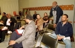 Mel King (standing), former director of the Community Fellows Program (now CRCP), speaks at "In Search of Community: From Knowledge for Profit to Competitive Intelligence."
