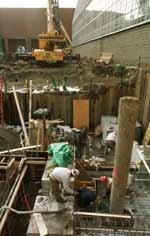 Workmen at the Zesiger Athletic Center work on footings and an elevator shaft. (The Johnson Athletics Center is in the background and Rockwell Cage is at right.)