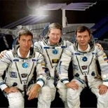 ISS Expedition One Commander and MIT graduate William M. Shepherd (center) is flanked by Soyuz Commander Yuri P. Gidzenko (right) and Flight Engineer Sergei Krikalev (left) in this crew photograph, taken during a break in training in Russia.