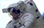 John Grunsfeld performing an EVA to service the Hubble Space Telescope on STS-103 in December 1999.