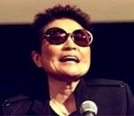 Yoko Ono laughs during the press conference prior to the opening of "YES Yoko Ono."