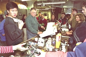 Students pass around a common household  faucet in "Introduction to Household Plumbing," an IAP course taught  by Facilities plumber Dan Gustafson.