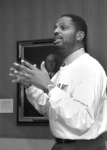 Karl Reid, executive director of special programs at MIT, addresses local        students and their parents during an orientation session Thursday on SEED, a new educational program for high school students.