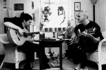Niï¿½o de Pantalï¿½on (left) and Josï¿½ F. A. Oliver practice their unique hybrid of music and poetry.