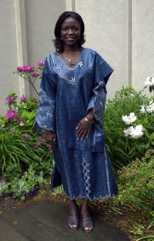 Regina Sam of Ghana in her native dress in the garden of McCormick Hall.