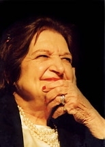 Helen Thomas flashes a rare smile.