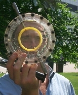 Saul Griffith looks through the lens molder of the portable device he invented to make low-cost prescription eyeglasses for people in the developing world. Griffith won the Collegiate Inventors Competition and was inducted into the Inventors Hall of Fame last month.