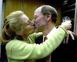 After his Nobel Prize lecture at MIT, Robert Horvitz gets a kiss from his wife, Martha Constantine-Paton, also an MIT professor of biology.