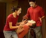 Vanessa Cheung (left) mimes escapades in an elevator with fellow mimes Tanya Burka, falling (face up) and Jonathan Ho in a performance last month.